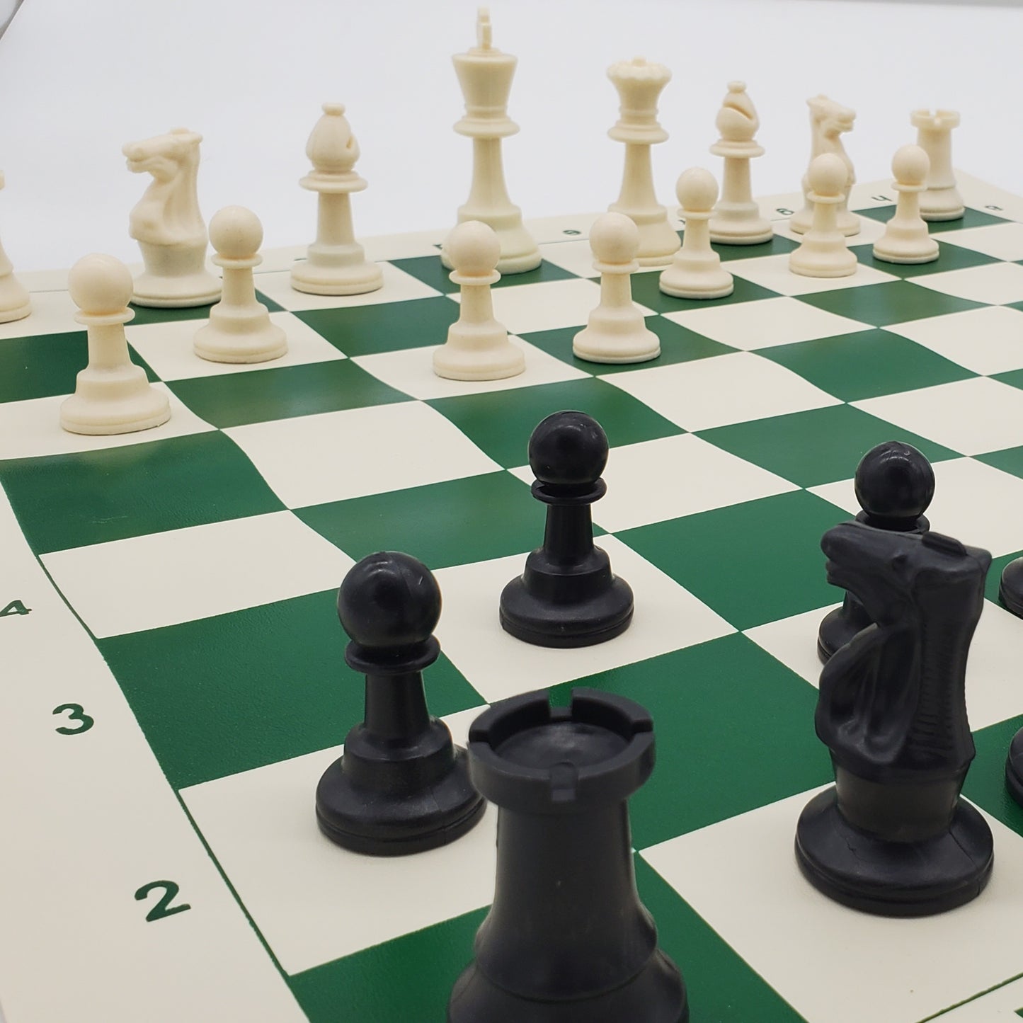 Chess with rollable mat